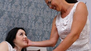 Sexy beautiful babe getting a special treatment from her mature lesbian lover