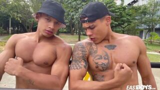 Two sexy latino guys show their muscles